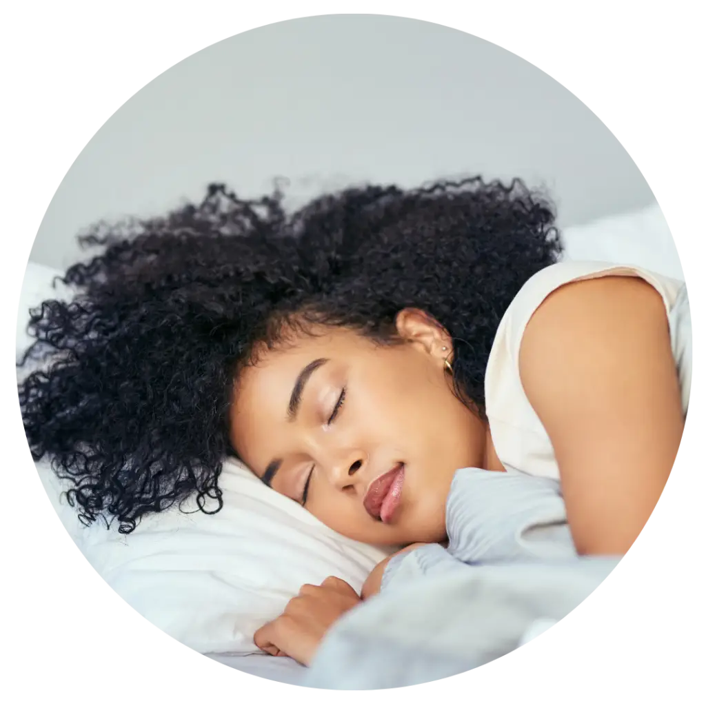 Person peacefully sleeping on white pillow