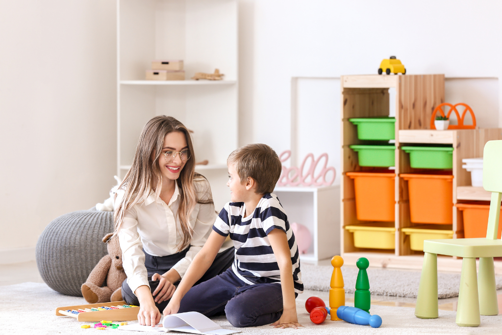 Woman and child engaging in play-based activities and learning at home