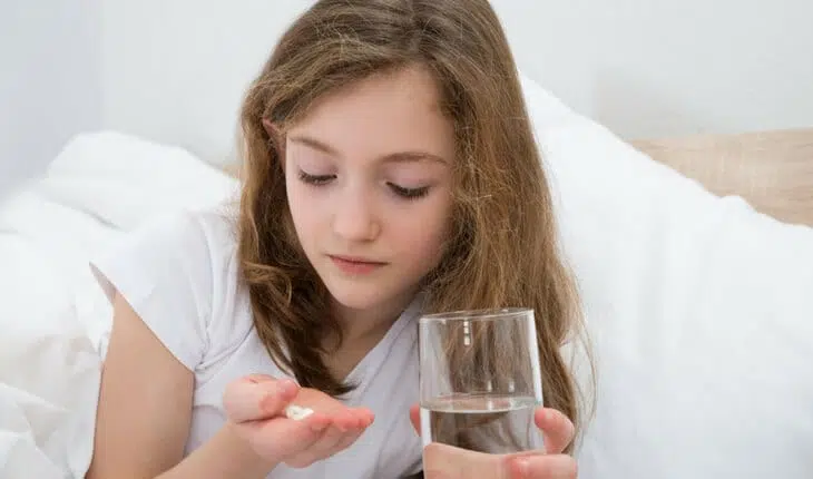 young girl with ADHD medication