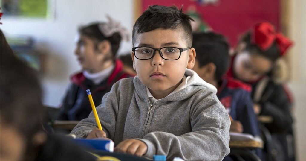 young boy at school with ADHD learning disability