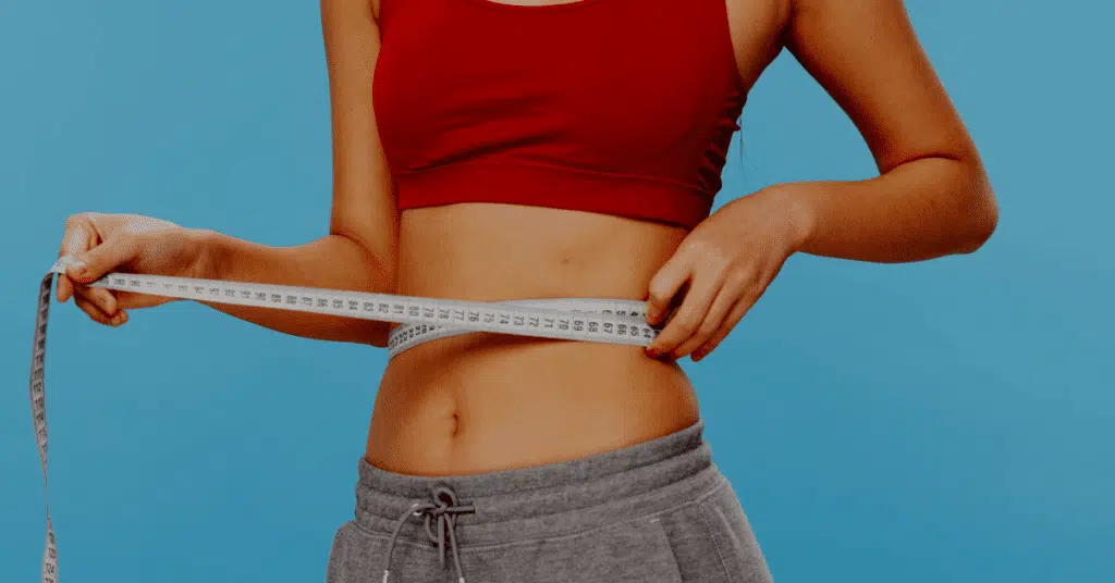 Women measuring her stomach