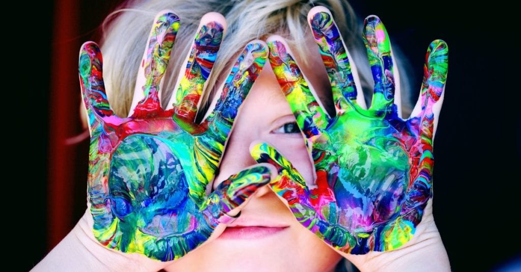 child with creative hand paint