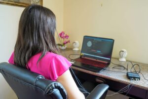 Girl on a neurofeedback test