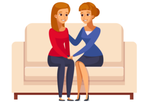 Two women participating in the BrainBehaviorReset™ Program on a couch.