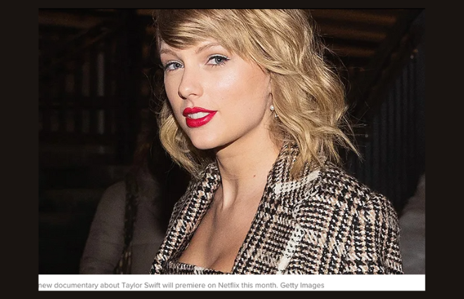 Taylor Swift is wearing a plaid jacket in her media kit.