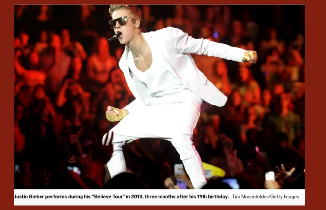 Justin Bieber performs at the MTV Music Awards, capturing the attention of media in his mesmerizing performance.
