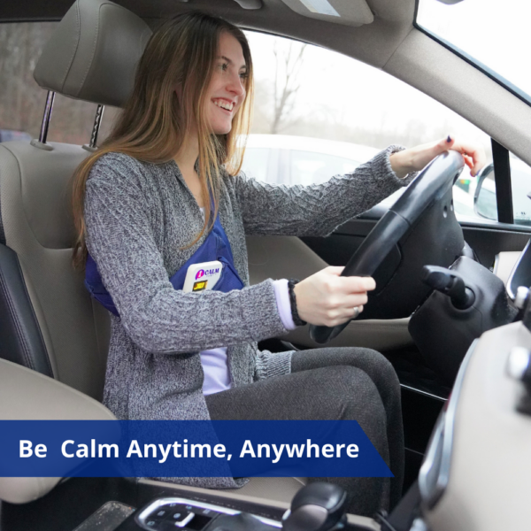 A woman using the Calm PEMF™ technology in her car to enhance attention and learning.
