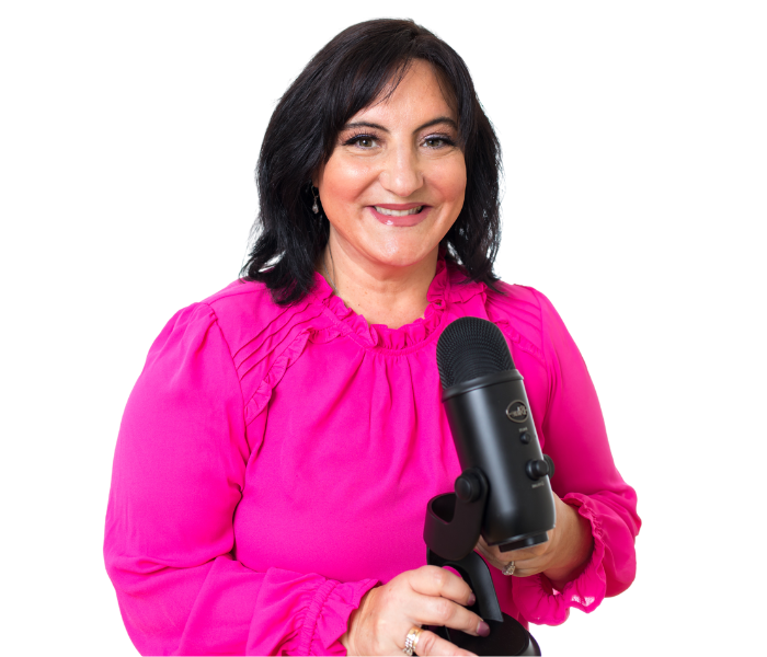 A woman holding a microphone in front of a black background.