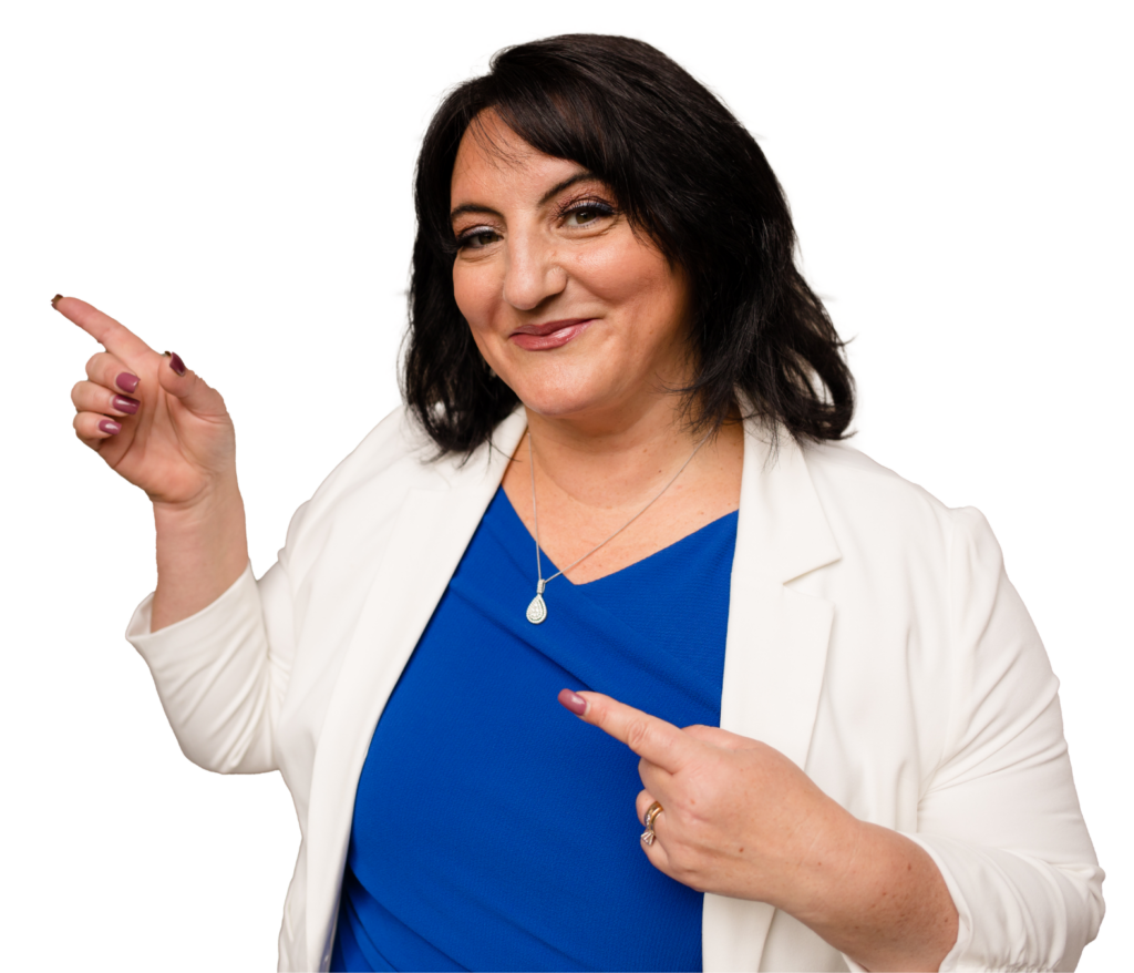 A woman pointing at something, showing how she can help in a white blazer and blue shirt.